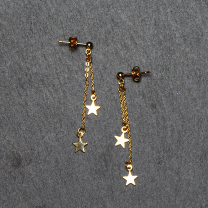 Gold plated double drop star earrings with elegant chain design by Suzie Blue Canada, featuring star-shaped drops and delicate links.
