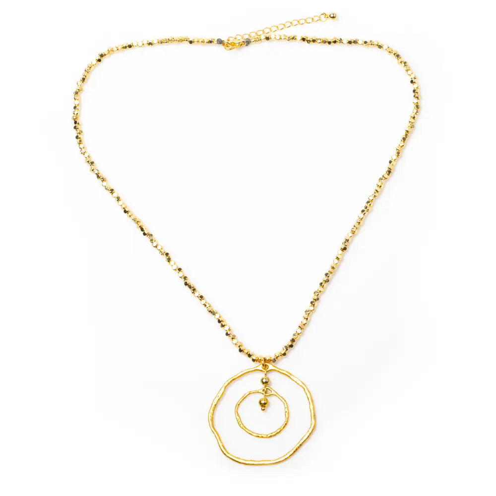Gold plated beaten double ring necklace by Suzie Blue Canada, featuring a stylish and elegant design.