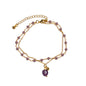 Amethyst glass bead bracelet with gold plate accents, stylish jewelry accessory from Suzie Blue Canada.