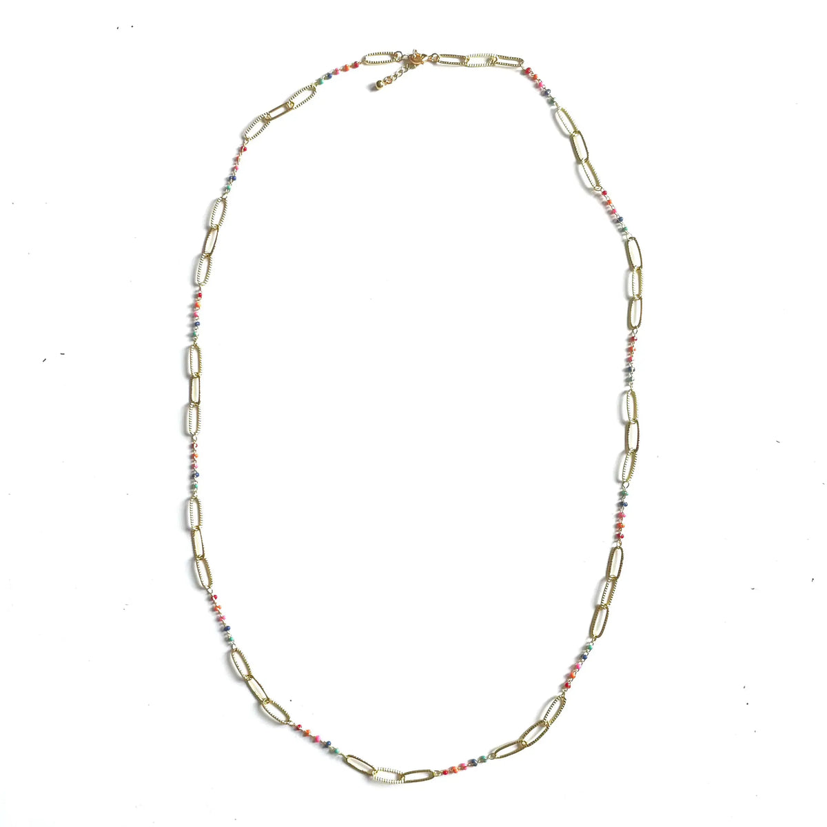 Long chainlink enamel necklace by Suzie Blue Canada featuring vibrant colored enamel links for elegant style.