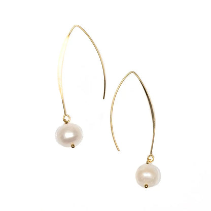 Gold-plated pearl hook earrings by Suzie Blue Canada featuring elegant, timeless jewelry design with lustrous pearls and sleek hooks.