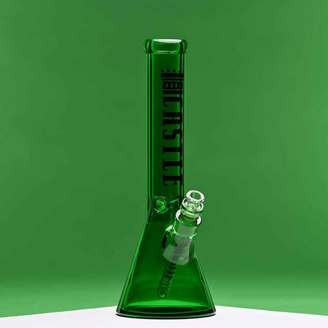Green 14-inch Castle Glassworks beaker bong with heavy-duty 7mm electroplated glass, shown against a green background.