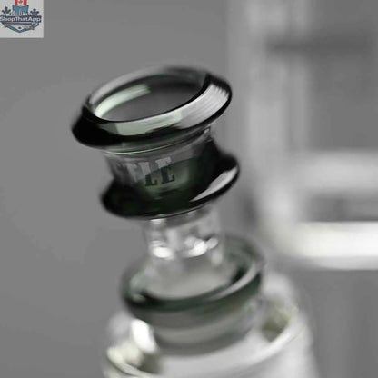 Castle Glassworks 14-inch beaker bong with colored logo and 9-hole downstem, close-up shot against grey background.