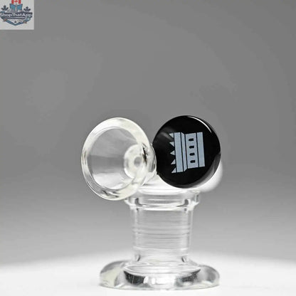 Castle Glassworks 14mm borosilicate glass round tab bowl with grey finish, shown on a grey background, left side view.