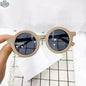 Eco Shades sunglasses by Wild Baby featuring stylish, eco-friendly frames and tinted lenses, perfect for sustainable fashion.