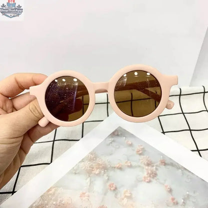Wild Baby Eco Shades sunglasses with stylish, eco-friendly frames for sustainable fashion, shown in a clear front view.