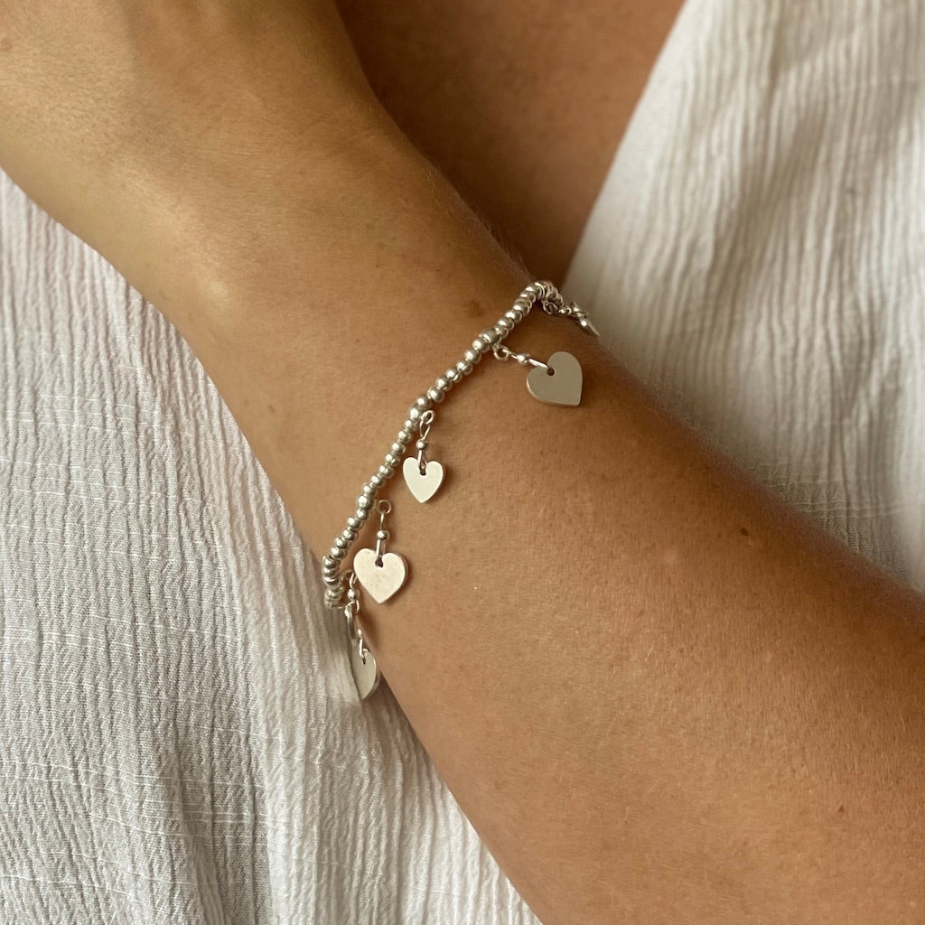 Silver Heart Charm Bracelet with Elasticated Design - Shopthatapp.ca