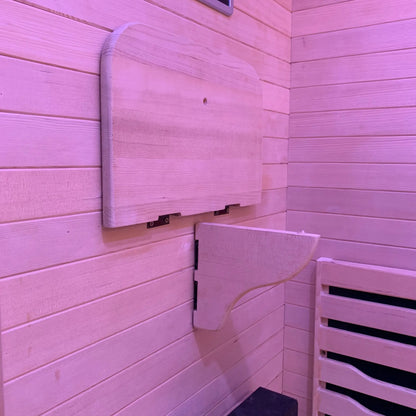 Zoppinh Blisspod Helsinki indoor sauna for two with full spectrum lighting and red light therapy, featuring wooden interior and digital controls.