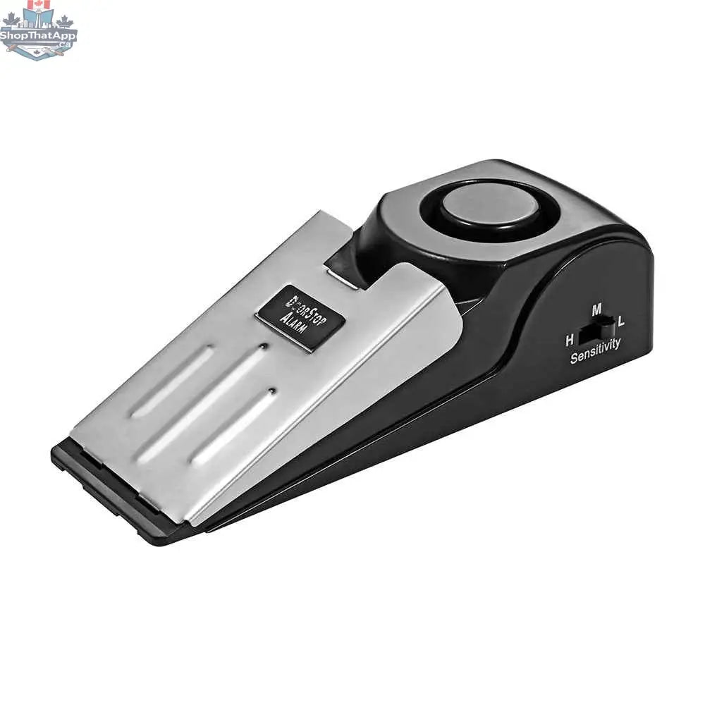 777tech home security door alarm with 125dB portable vibration sensor, used as a door stop for enhanced travel security.