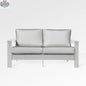 Enclover Hickory loveseat with white Sunbrella cushions and granite fabric, outdoor sofa with a sturdy frame and comfortable seating.