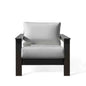 Krikacy Hickory outdoor club chair with black marine-grade polymer frame and Sunbrella® granite cushions for comfortable outdoor seating.