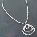 Silver Ball Necklace With Triple Ring Pendant In Silver Plate - Shopthatapp.ca