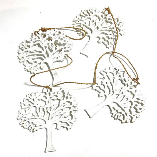 String of five white wooden trees for home decor, featuring elegant white wooden tree design by Suzie Blue Canada.