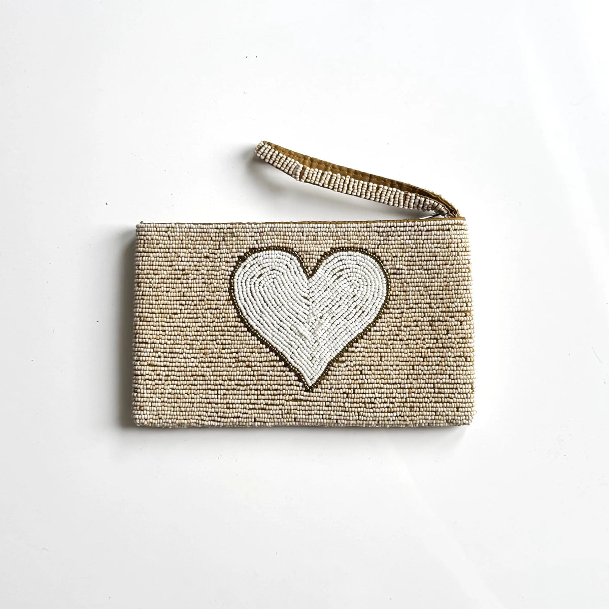 Beaded heart-shaped clutch purse by Suzie Blue Canada with intricate beadwork and a compact design for evening use.