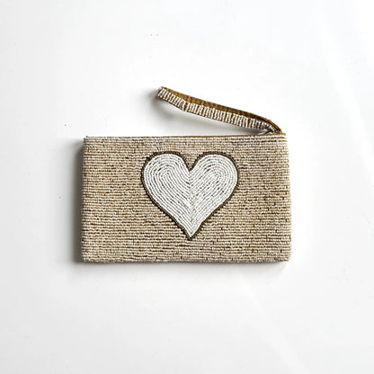 Beaded heart-shaped clutch purse by Suzie Blue Canada with intricate beadwork and a compact design for evening use.