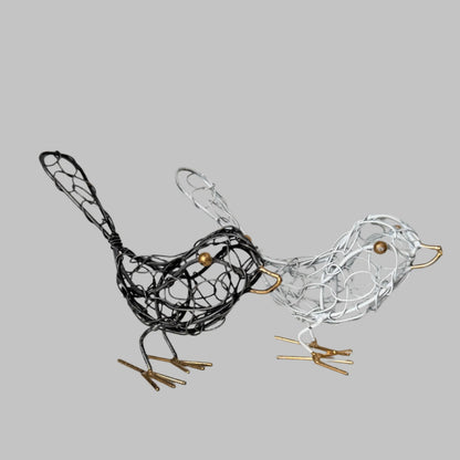 Black wire bird sculpture for home decor, artistically crafted decorative wire art piece by Suzie Blue Canada.