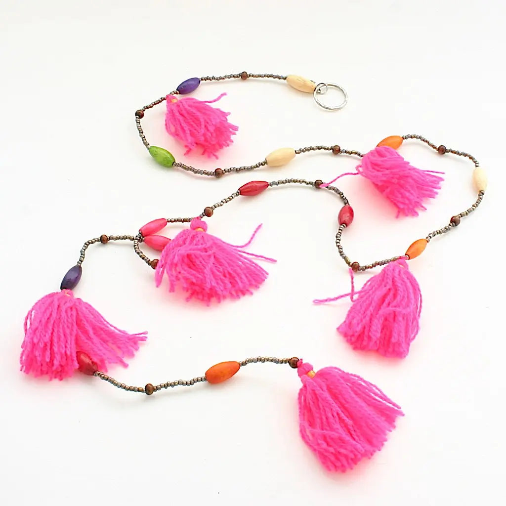 Colorful tassel garland by Suzie Blue Canada with vibrant tassels for festive home décor and celebrations.