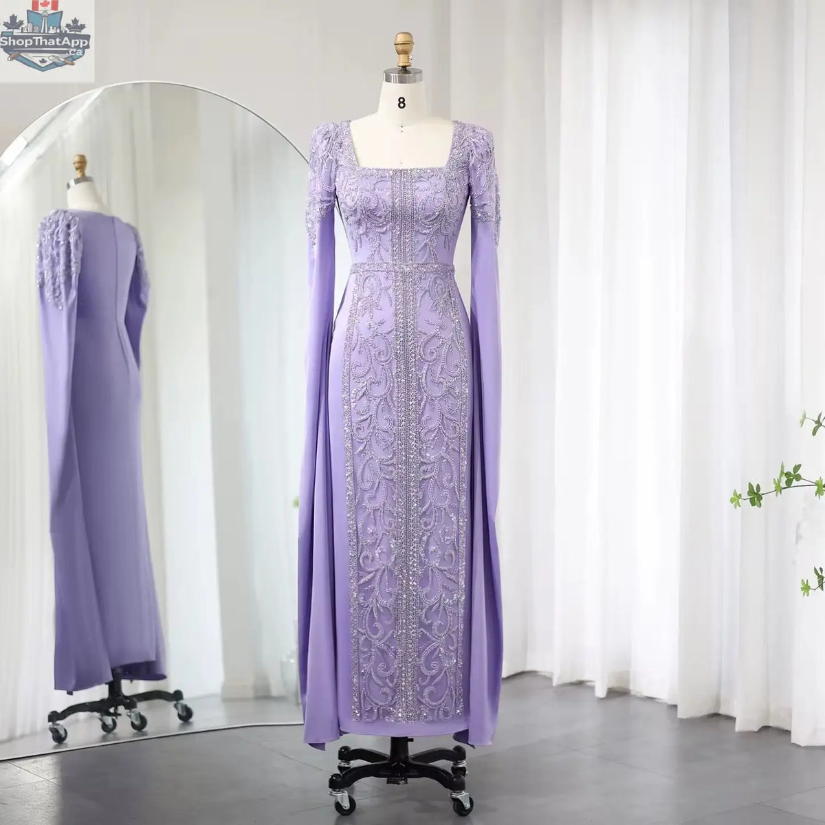 Elegant Threads evening kaftan gown with cape sleeves, perfect for elegant occasions, featuring a flowing, stylish design.