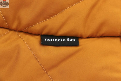 Northern Sun bucket down hat, stylish and functional hat with a wide brim and cozy lining, perfect for outdoor wear in all seasons.