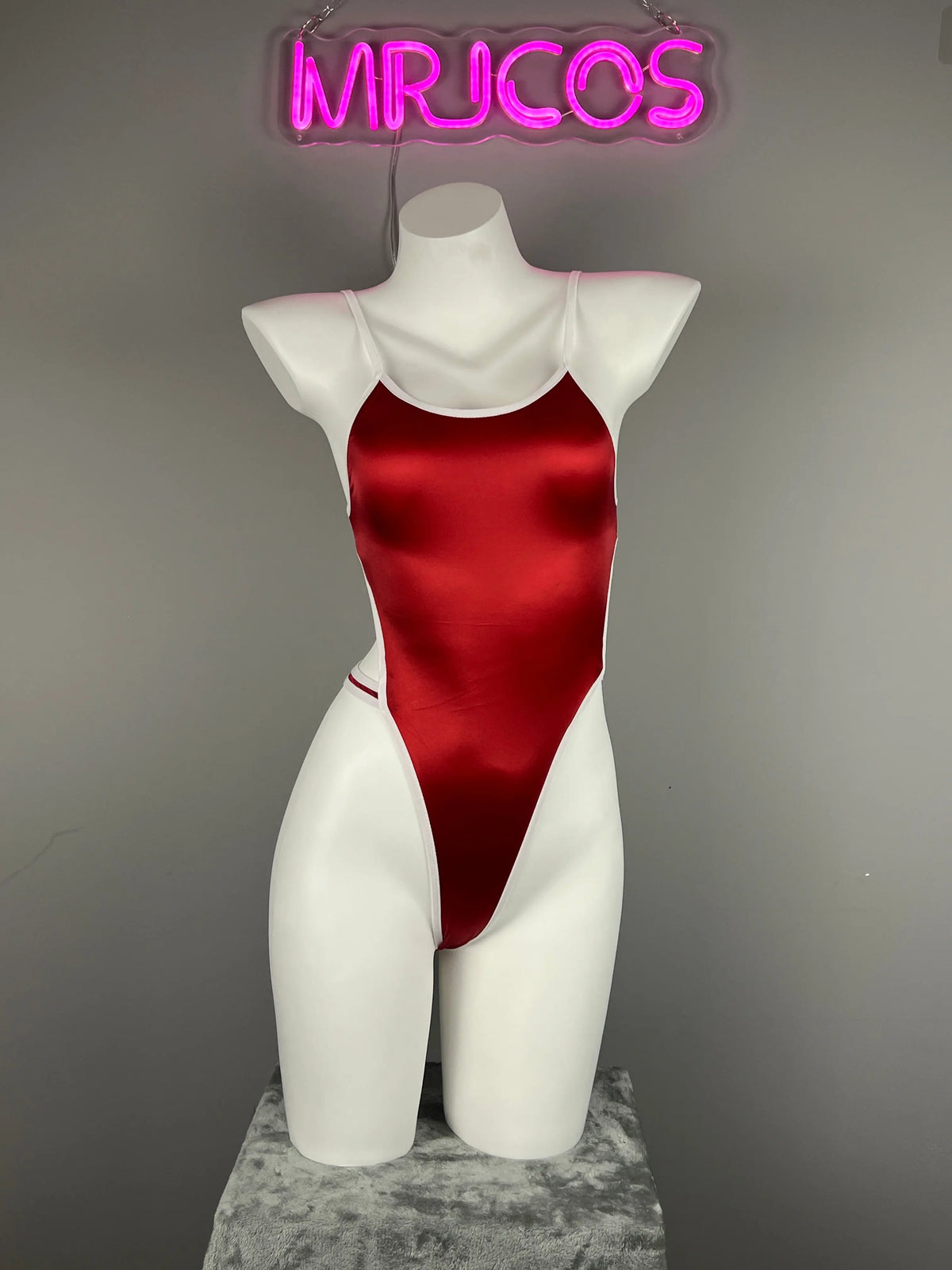 Women's high-cut one-piece swimsuit by MRJCOS featuring satin spandex fabric and stylish side cutouts.