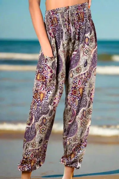 Purple paisley print pants from Suzie Blue Canada, boho chic style, with flowy fabric and relaxed fit.