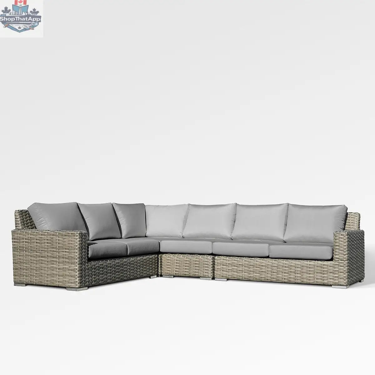 Enclover Jasmine sectional sofa with Sunbrella cushions in granite fabric, showcasing a modern and comfortable living room setup.