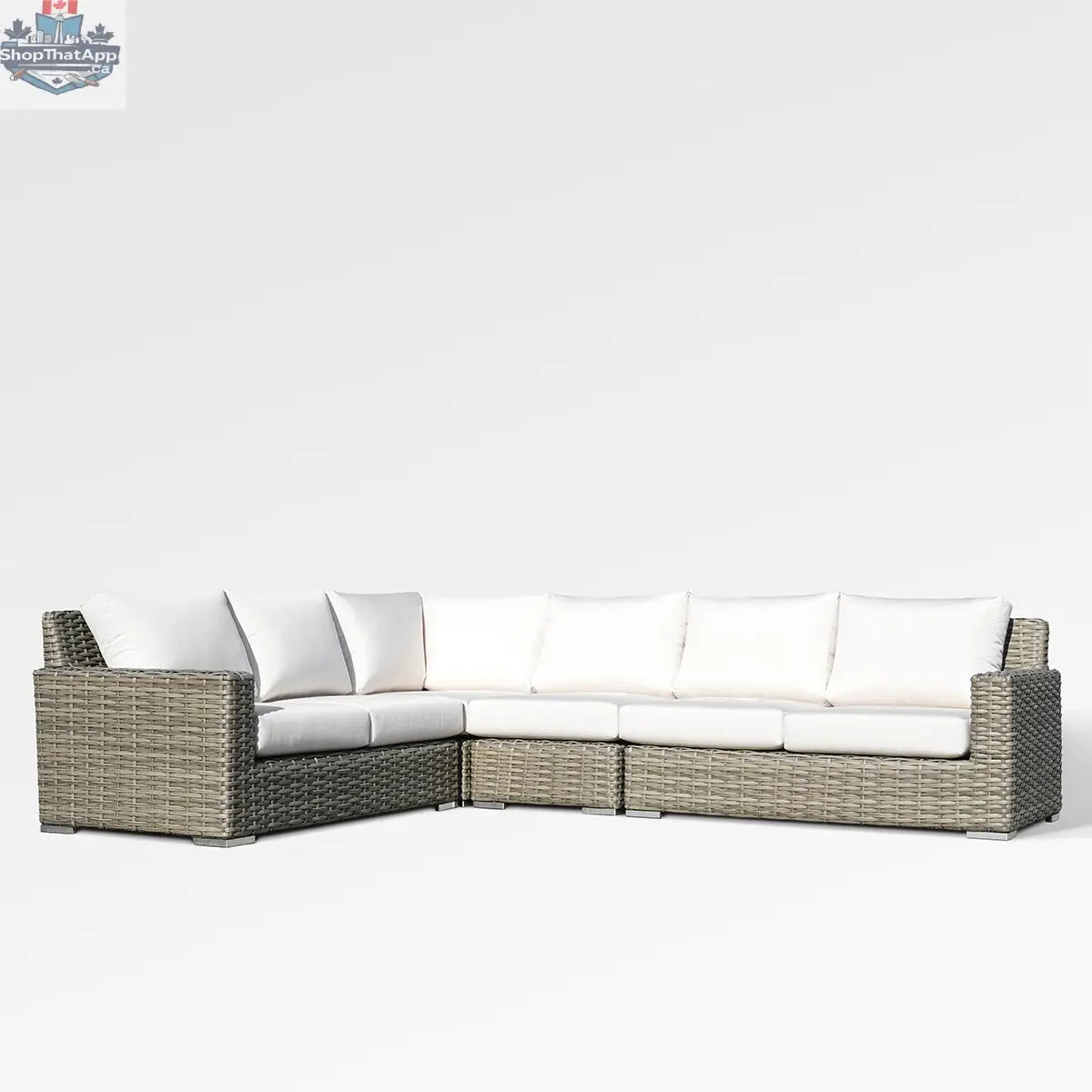 Enclover Jasmine sectional sofa with Sunbrella canvas white cushions, showcasing a stylish and comfortable living room setup.