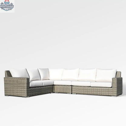 Enclover Jasmine sectional sofa with Sunbrella canvas white cushions, showcasing a stylish and comfortable living room setup.