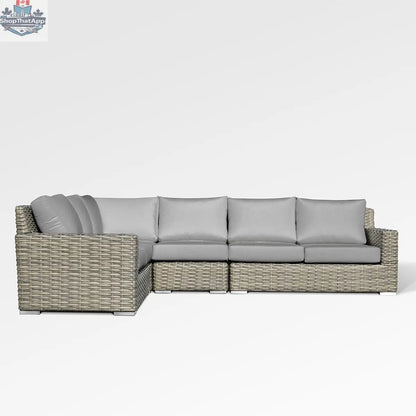 Enclover Jasmine sectional sofa with Sunbrella cushions in granite canvas, showcasing comfortable, stylish seating in a modern living room.