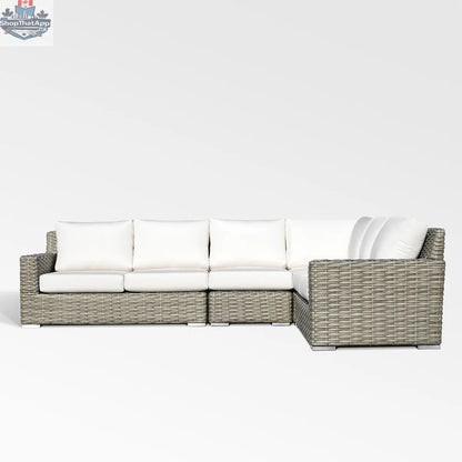 Enclover Jasmine sectional sofa with Sunbrella white canvas cushions, showcasing a modern, comfortable, and stylish living room setup.