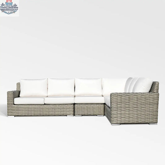 Enclover Jasmine sectional sofa with Sunbrella white canvas cushions, showcasing a modern, comfortable, and stylish living room setup.
