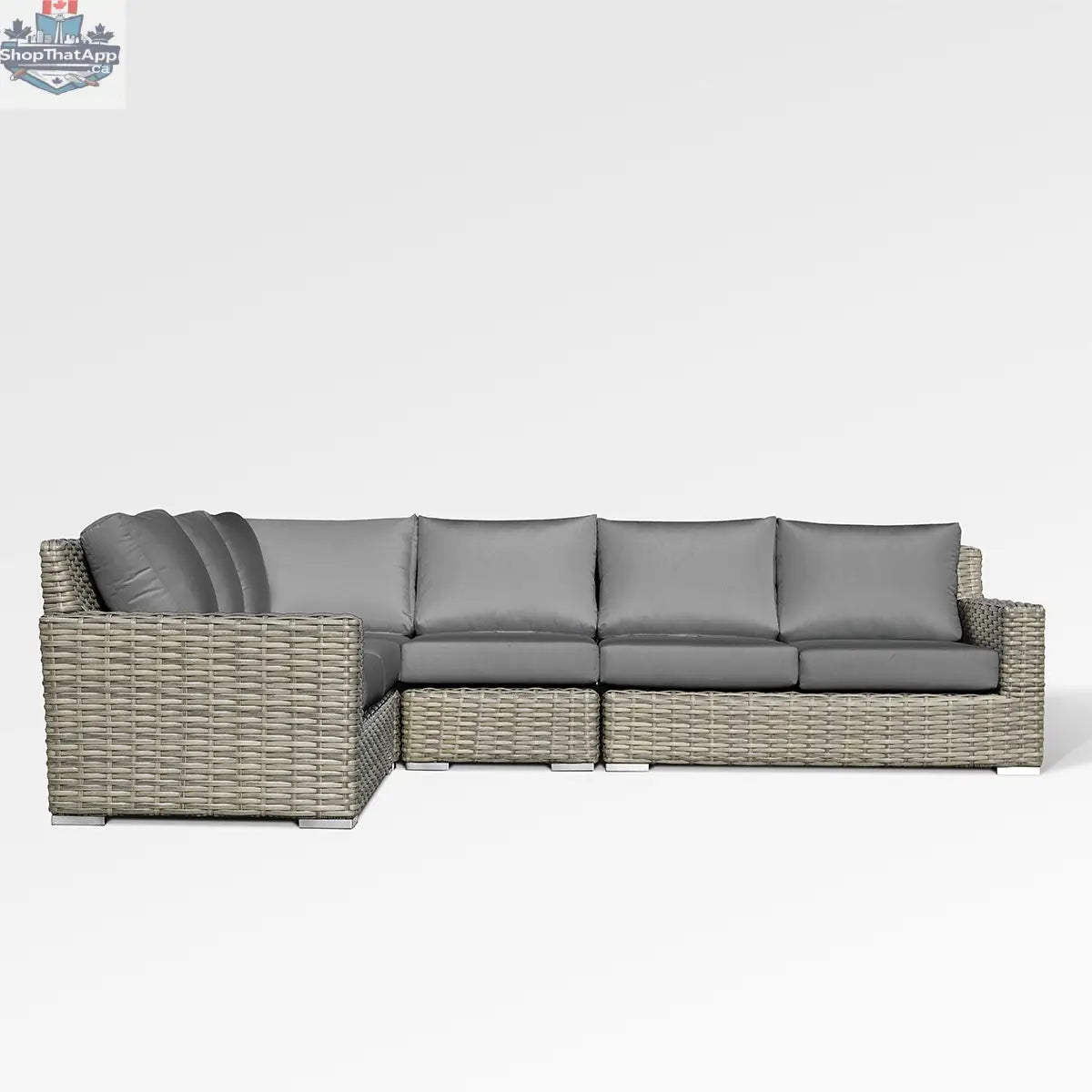Enclover Jasmine sectional sofa with Sunbrella cushions in cast slate, showcasing a stylish and comfortable living room setup.