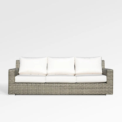 Enclover Jasmine outdoor sofa with white Sunbrella cushions, stylish and comfortable for outdoor lounging.