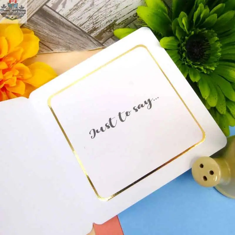 The Little Book of Inserts by Ecstasy Crafts showing colorful paper and cardstock pages for crafting projects.
