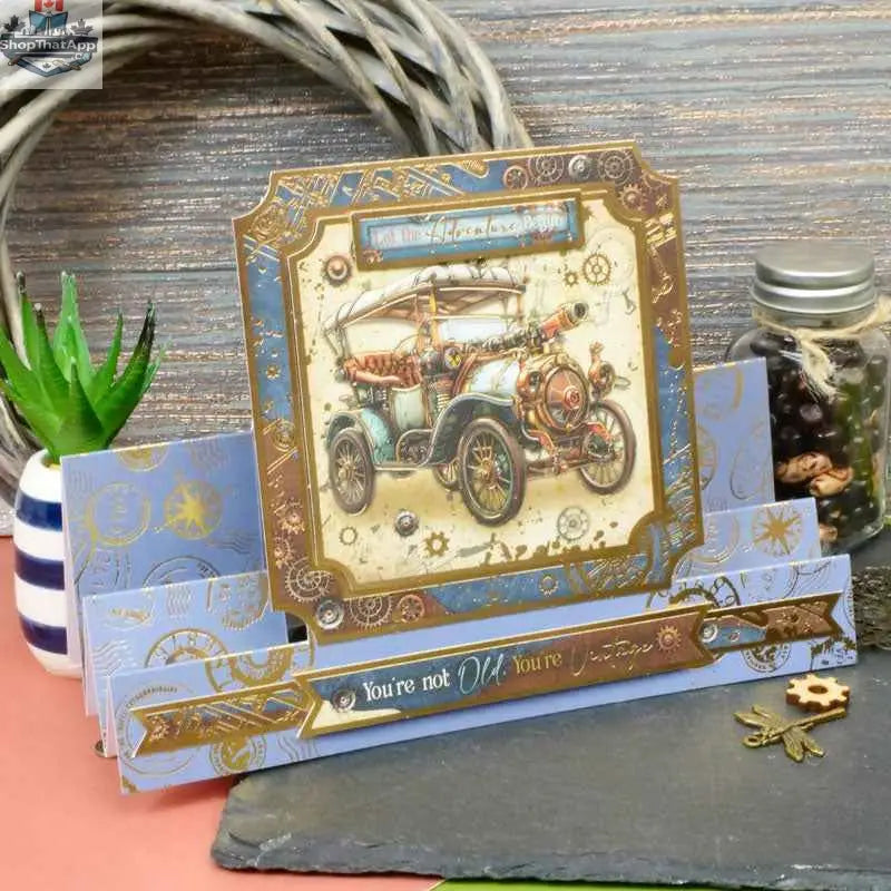 Luxury foiled cardstock from Clockwork Curiosities by Ecstasy Crafts, showcasing intricate metallic and textured specialty paper design.