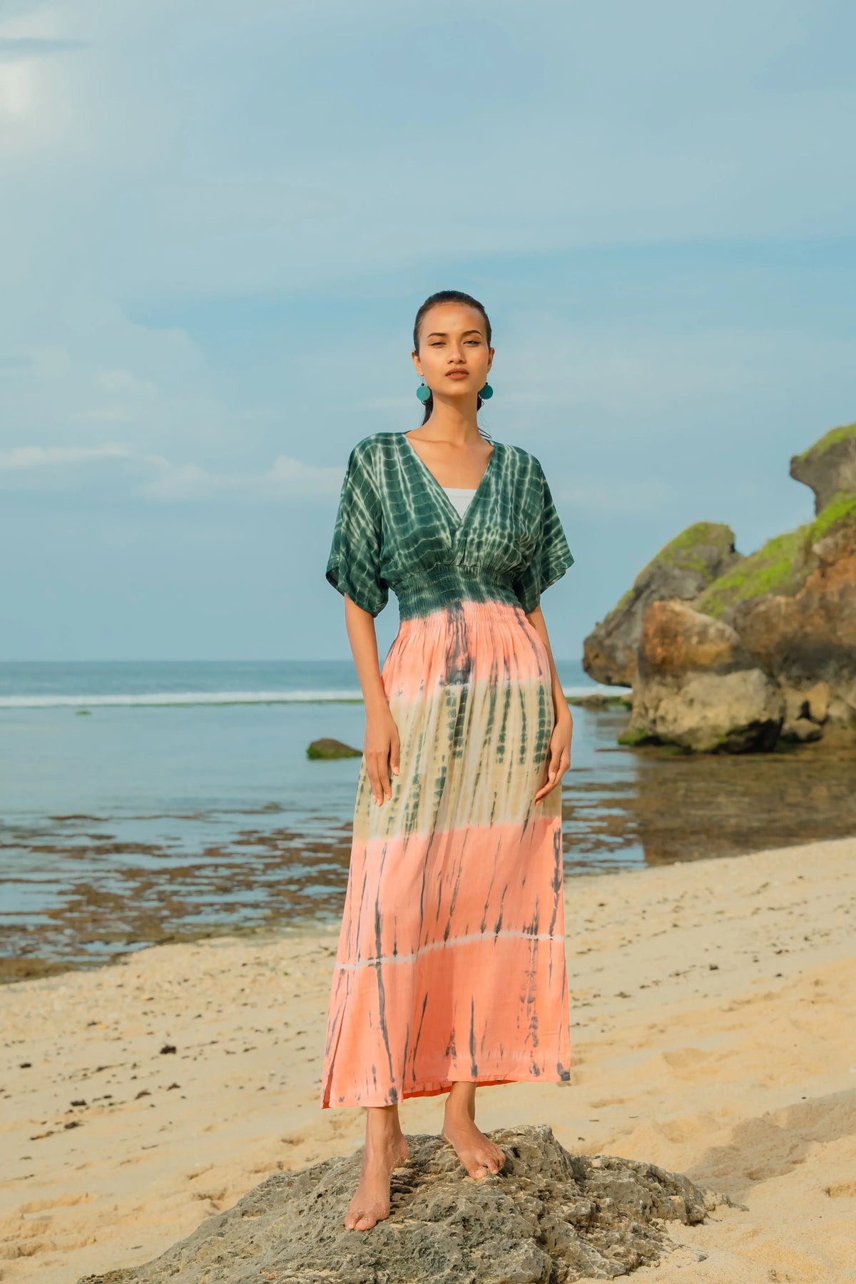 Pink tie-dye maxi dress by Suzie Blue Canada featuring a flowing, comfortable design perfect for casual or dressy occasions.