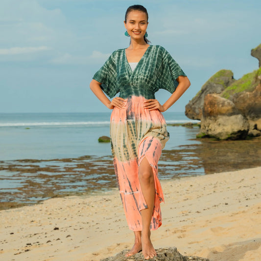 Colorful tie dye maxi dress by Suzie Blue Canada featuring a flowing silhouette and vibrant pattern for casual or dressy occasions.