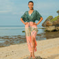 Colorful tie dye maxi dress by Suzie Blue Canada featuring a flowing silhouette and vibrant pattern for casual or dressy occasions.