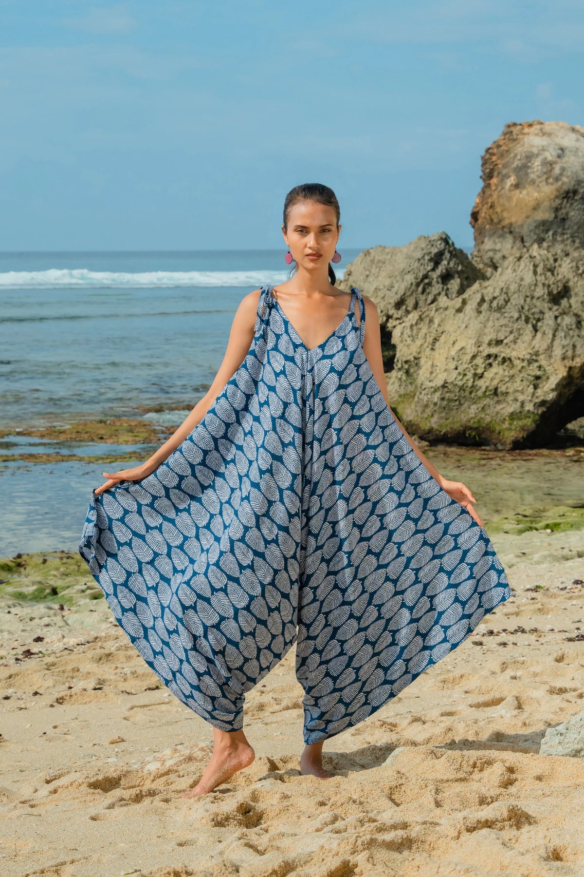Navy and white leaf print romper by Suzie Blue Canada, a playful summer outfit perfect for warm weather.