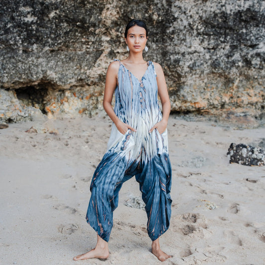 Tie dye romper in lapis ombre with grey and cream colors, by Suzie Blue Canada, featuring a casual, stylish one-piece design.