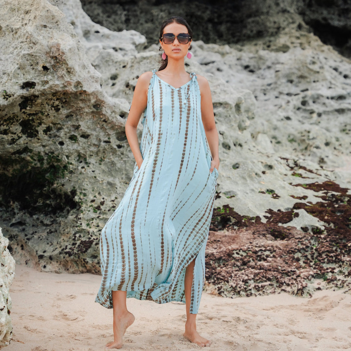 Mint tie-dye dress by Suzie Blue Canada featuring a simple, casual style and sleeveless design.