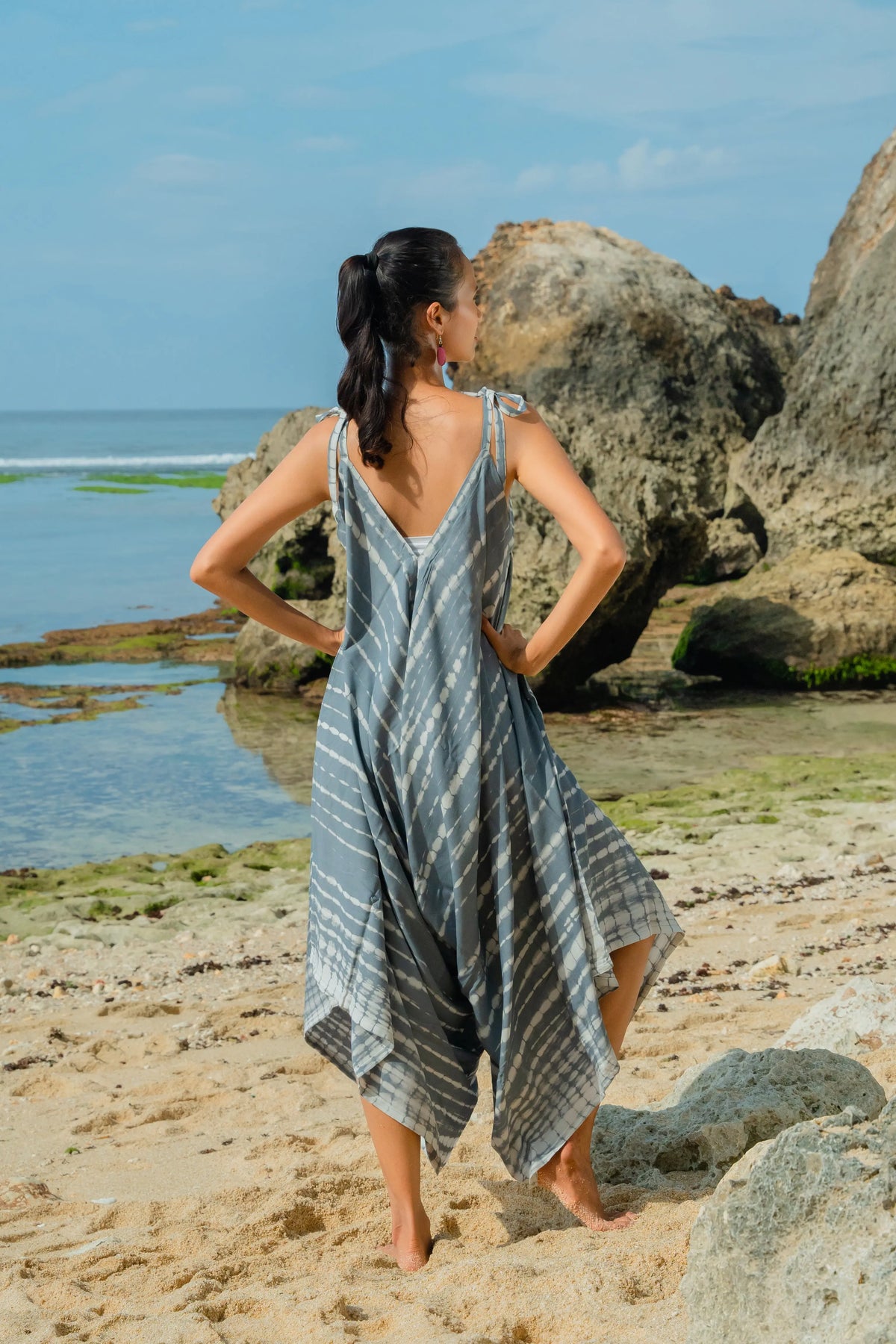 Grey and white tie-dye romper by Suzie Blue Canada, featuring a comfortable, casual design for children.