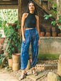 Blue Bone Tie Dye Bali Pants by Suzie Blue Canada with relaxed fit and bohemian style, shown on a model.