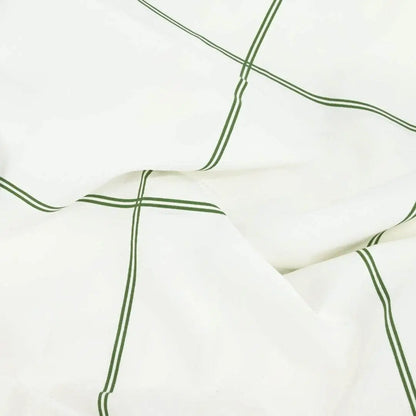 Organic percale duvet cover fabric swatch from Skylark+Owl Canada featuring leafy frame pattern for a natural, stylish look.