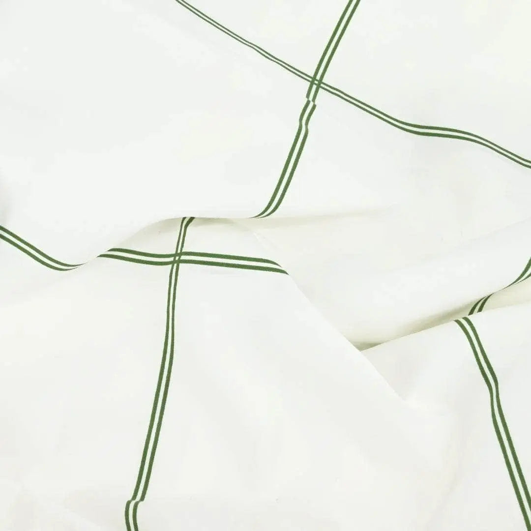 Organic percale pillowcase set from Skylark+Owl Canada featuring a leaf pattern fabric swatch.