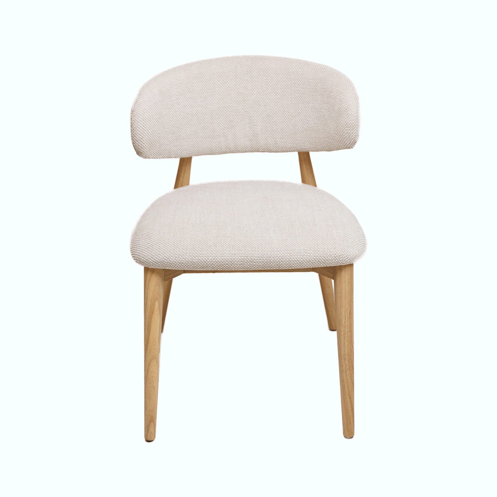 Hygge Design House Nero Vogar dining chair with sleek wooden legs and a modern upholstered black seat.