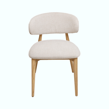 Hygge Design House Nero Vogar dining chair with sleek wooden legs and a modern upholstered black seat.