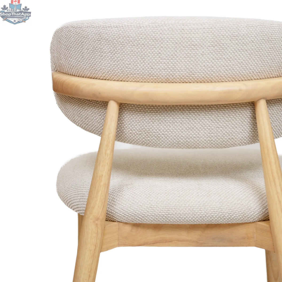 Hygge Design House Nero Vogar dining chair with wooden legs and upholstered seat, modern and stylish for contemporary dining rooms.