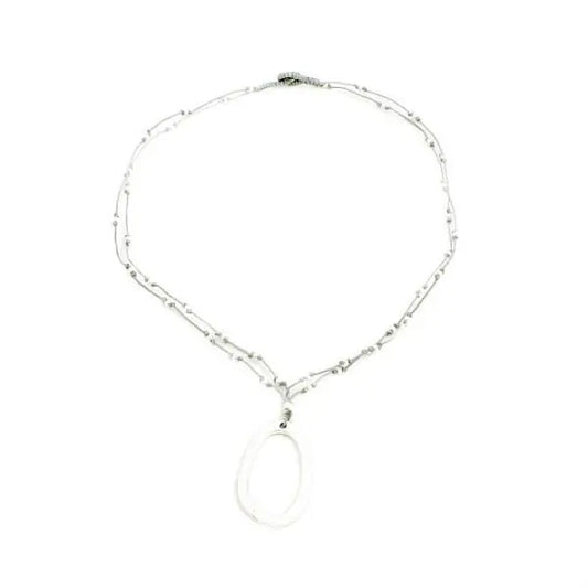 Suzie Blue Canada oval hoop necklace featuring a sleek, elegant gold-tone design on a delicate chain.