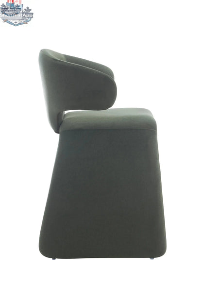 Modern Tessa Counter Chair by Hygge Design House, fully upholstered with plush cushioning and sleek design, shown from side view.